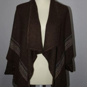Brown shawl with colorful accent stripes.